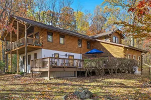 Image of Ultimate Cabin Getaway w\/ Hot Tub, Fire Pit and Lake to Recharge and Unwind!