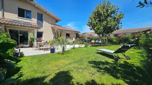 Image of Family home with garden close to ocean and forest