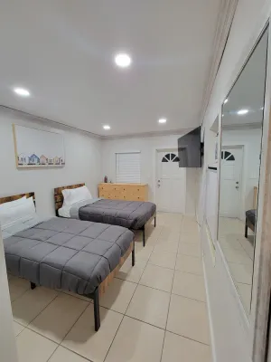 Image of Modern guest suite with adorable outdoor lounge!