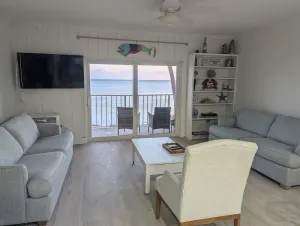 Image of Beachfront townhome. Steps to the beach, dock, pool, and tennis w\/pickle ball.