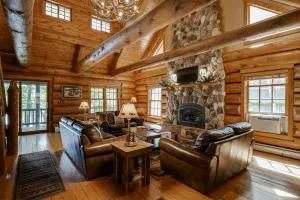 Image of Secluded waterfront log cabin with game room, dock, fire pit & deck