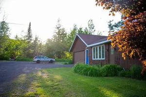 Image of Lake House with private sandy beach.