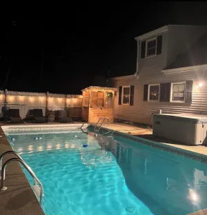 Image of Lovely Westerly home w\/ In-Ground Salt Water Pool, Hot Tub, and Game Room!