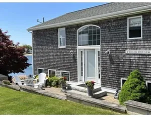 Image of Peaceful waterfront home with a spacious deck and four bedrooms.