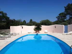 Image of House with large garden and secure swimming pool