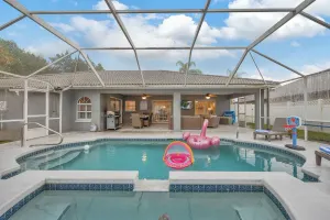 Image of 10 minutes From Beach! Sunny Oasis w Saltwater Pool, Pool Table & Lawn Games!