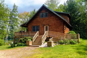 Image of Lakeside log cabin absolute escape! Private & spacious w\/hot tub, boats, firepit