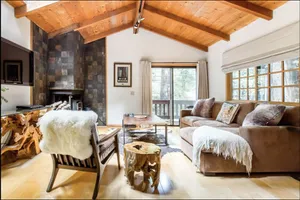 Image of Cabin Nestled in Forested Canyon