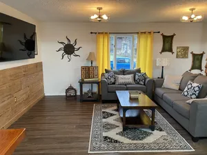Image of Spacious family home with luxe beds, fenced in back yard, heart of town!