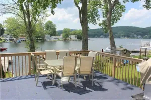 Image of The Cottage at Highland Lake, year-round, waterfront with a boat dock