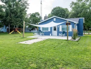 Image of Blue Lake Inn house is  across from Burtchville Park and Beach