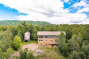 Image of Treehouse Retreat - Wood Burning Sauna - Scenic Views - Sleeps 12!