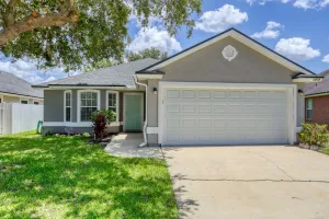 Image of Single-story home with lagoon view, garden patio & easy drive to the beach