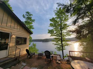 Image of Waterfront Location. Panoramic Views. Cozy Comforts. Treehouse Tranquility.