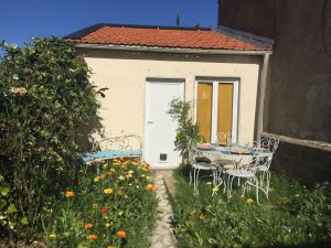 Image of The little house and its four bicycles