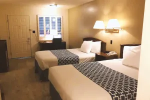Image of Coratel Inn & Suites By Jasper McCook - Standard 2 Queen Bed NS