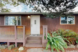 Image of Centrally-located, dog-friendly home w\/ a deck overlooking a beautiful waterway