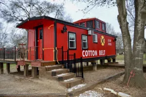 Image of Water Front 1920's Vintage Cotton Belt Caboose