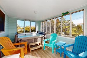 Image of Bright island home with pool, private hot tub, deck with views, AC, & W\/D