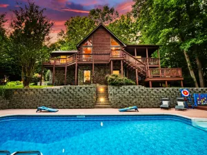 Image of Private Luxe Riverfront Cabin: Pool; Hot Tub; Fire pit; Game Room; Disc Golf