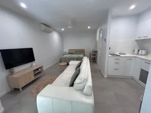 Image of Entire studio with kitchenette, bathroom and outdoor area