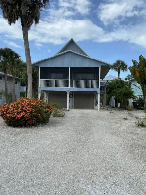 Image of Adorable Tropical Getaway Just Steps From The Beach. Gulf Views And New Pool!!!