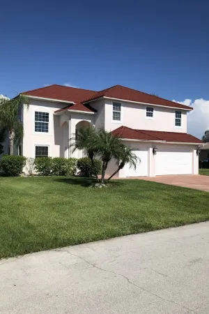 Image of Spacious home with heated pool, and modern amenities.
