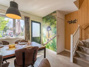 Image of Cosy tiny house on park with playground