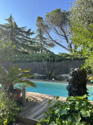 Image of House in a lush garden