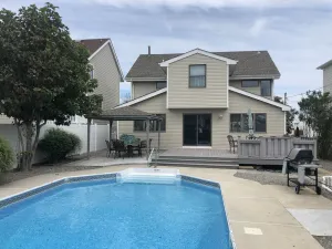 Image of Home with IN-GROUND HEATED POOL best for large families 7 min walk to boardwalk