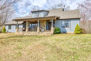 Image of Wholesome retreat near the lake & town with patio & full kitchen