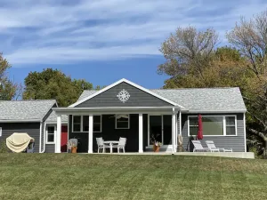 Image of Nautical lakeview home with boat launch across the street from your rental home.