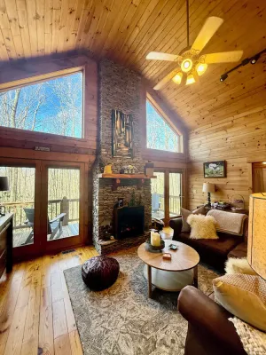 Image of Serenity Meets Convenience - Honey Bear Log Cabin Near Downtown West Jefferson