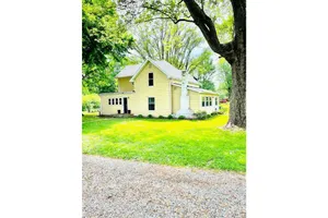 Image of Rustic Farmhouse with Spacious Wooded Lot