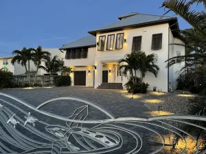 Image of SEASIDE PARADISE. Palm trees, Hammocks, Heated Pool