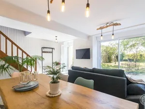 Image of \"Charming Coastal Retreat: Modern Amenities, Enclosed Garden, Close to Beach, Pet-Friendly\"