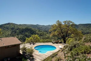 Image of Mountaintop open home living-pool, hot tub & views!