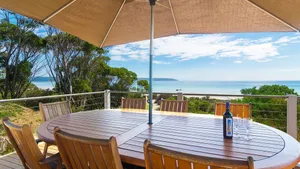 Image of Beach Front. Panoramic Views. Kayaks. Nestled in Nature