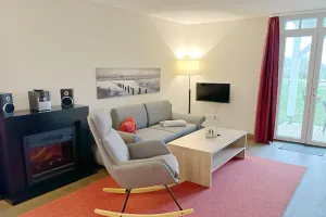 Image of Lovely vacation apartment close to the beach with its own sauna and terrace with beach chair - Resort Deichgraf