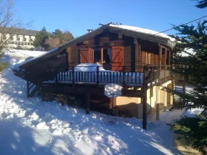 Image of Scandinavian wood and stone chalet near the ski slopes
