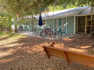 Image of A comfortable home in a quiet neighborhood graced with Spanish Moss draped oaks.
