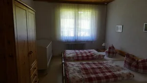 Image of A spacious, family-friendly apartment with a large garden