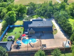 Image of HEATED POOL, HOT TUB, AMAZING TURF, GAMES GALORE LUXURY VILLA IN OKC