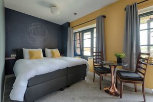 Image of Modern apartment with smart TV, private kitchen, and bathroom located in the heart of Tilburg.