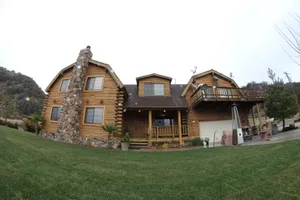 Image of Luxury Log Home Resort, 10 bedrooms on 22 Acres, surrounded by its own mountains