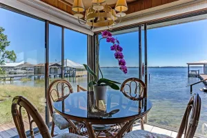 Image of Spectacular Views On A Pristine Lake, Home sits at the waters edge for best view