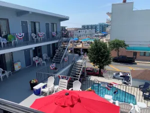 Image of Comfy condo 1 block to beach and boards. Perfect for your family beach vacation!