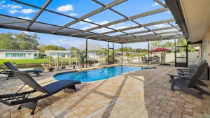 Image of Serenity by the Bay Waterfront HEATED POOL is an option. BOAT LIFT WITH KAYAK
