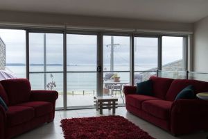 Image of Beautiful Beach front villa with views over Caseys Beach from every window