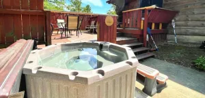 Image of Log Cabin with Brand-new Hot Tub! W\/ Pool Table - Near Downtown Cape and Casino